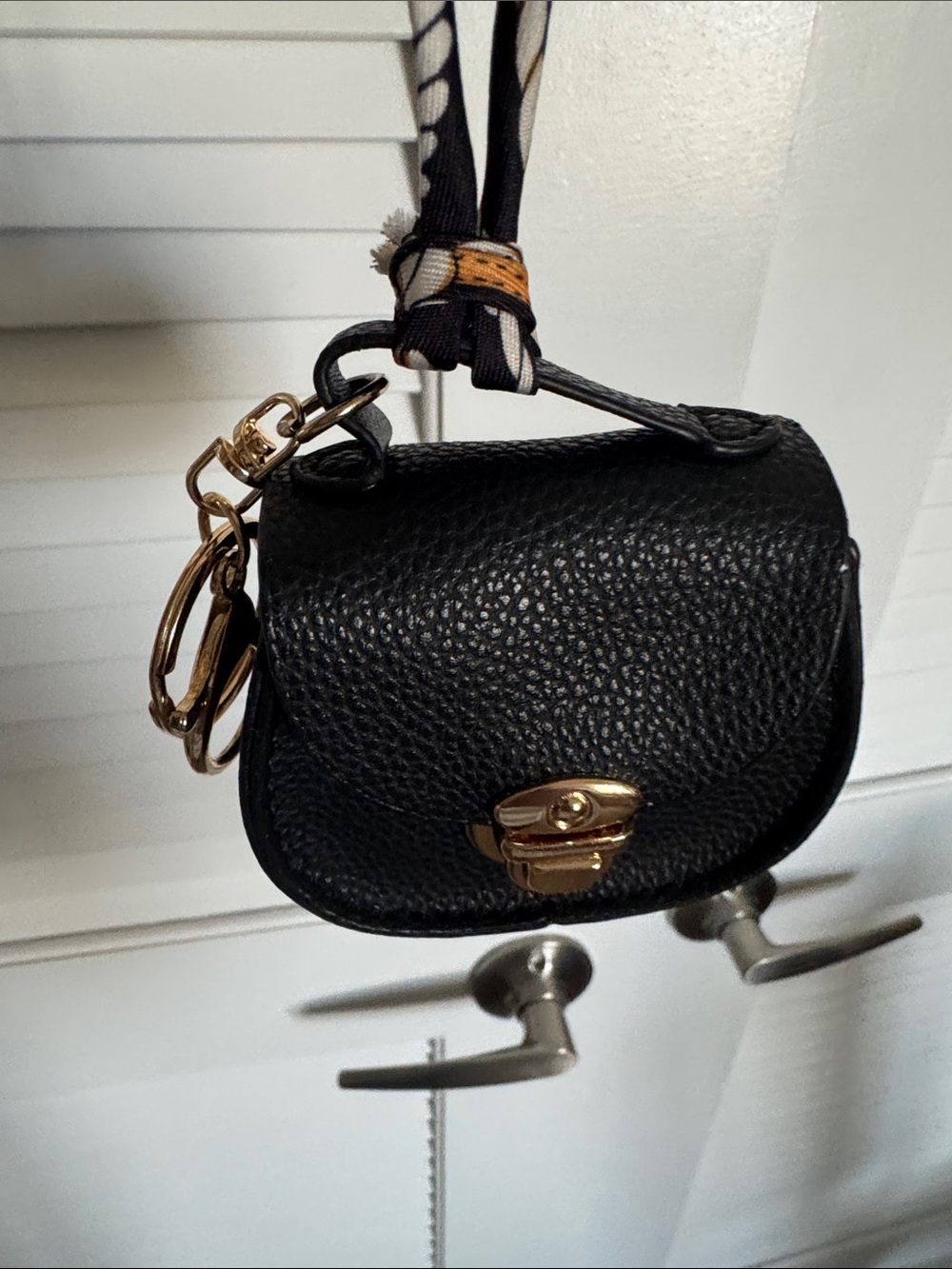 Black Pebbled Leather Mini Crossbody Bag with Gold Hardware